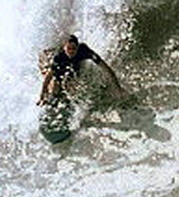Mystery Kneelo
This is from the Wedge pic by Joel That Will P posted.  Clear up the controversy.  Yes, it's a kneelo.   No Greg, it's not Ler in drag, looks like a guy, maybe even some facial hair.  I still think it could be Zeke, board looks small and narrow to me.
